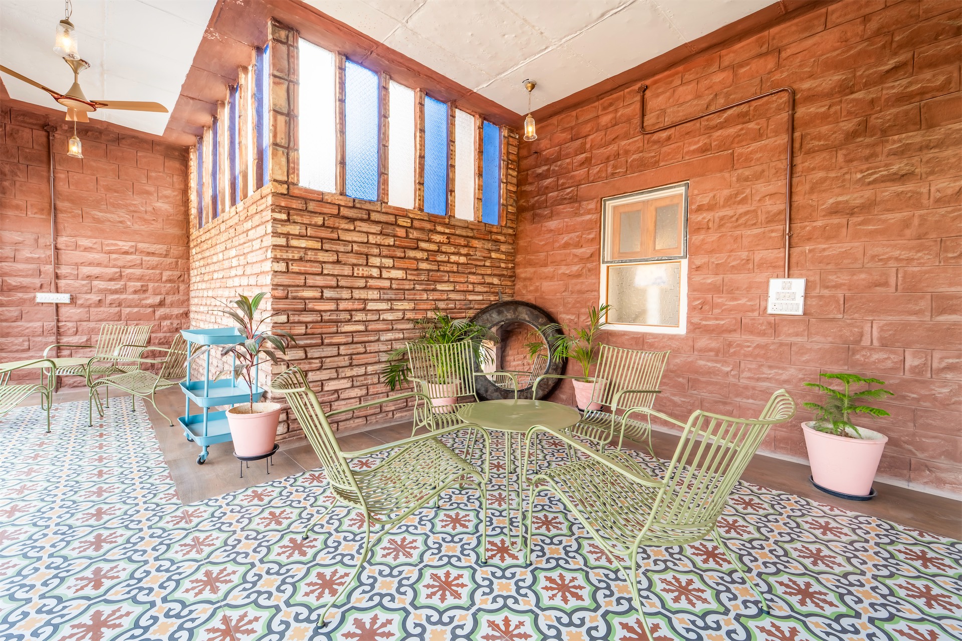 Common seating area with colorful tile flooring