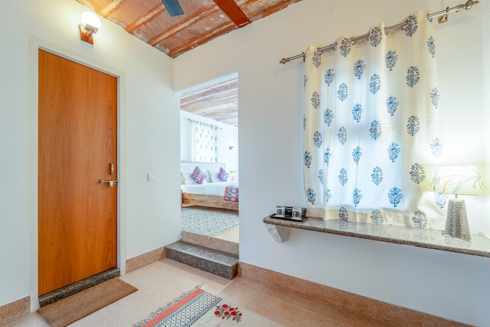Comfort Suite — room entrance with warm lighting
